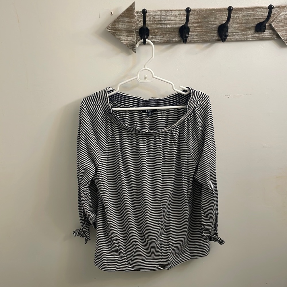 This is a shirt from the brand chops denim and it is a women’s large.